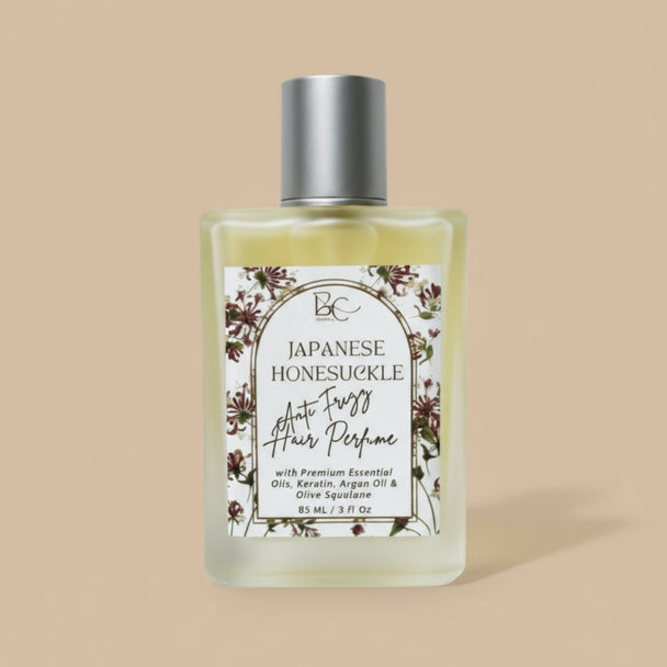 Bottle of Japanese Honeysuckle hair perfume with a floral label on a white background representing best natural hair perfume