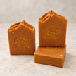 Three Australian handmade 2% kojic acid soap bars with organic turmeric, carrot and grass-fed tallow