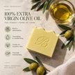 Extra virgin olive oil hero ingredient with traditional Castile soap bar