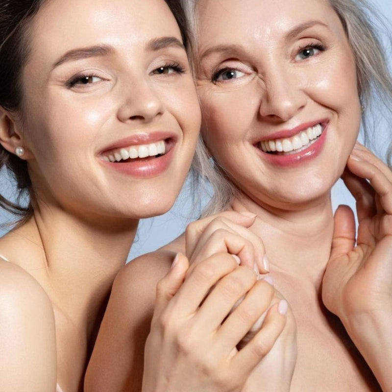 photo of mother and daughter both with beautiful radiant wrinkle free skin representing natural anti aging Australian skincare.