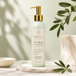 2% BHA salicylic acid face cleanser by Bubble Clinic with zinc pyrithione, niacinamide and vitamin C. Premium skincare bottle on a marble pedestal with soft sage background for blemish-prone, oily and congested skin.