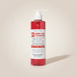 Red bottle of BHA 2 % salicylic acid Gel Cleanser with pump on a beige background representing best Australian acne skincare