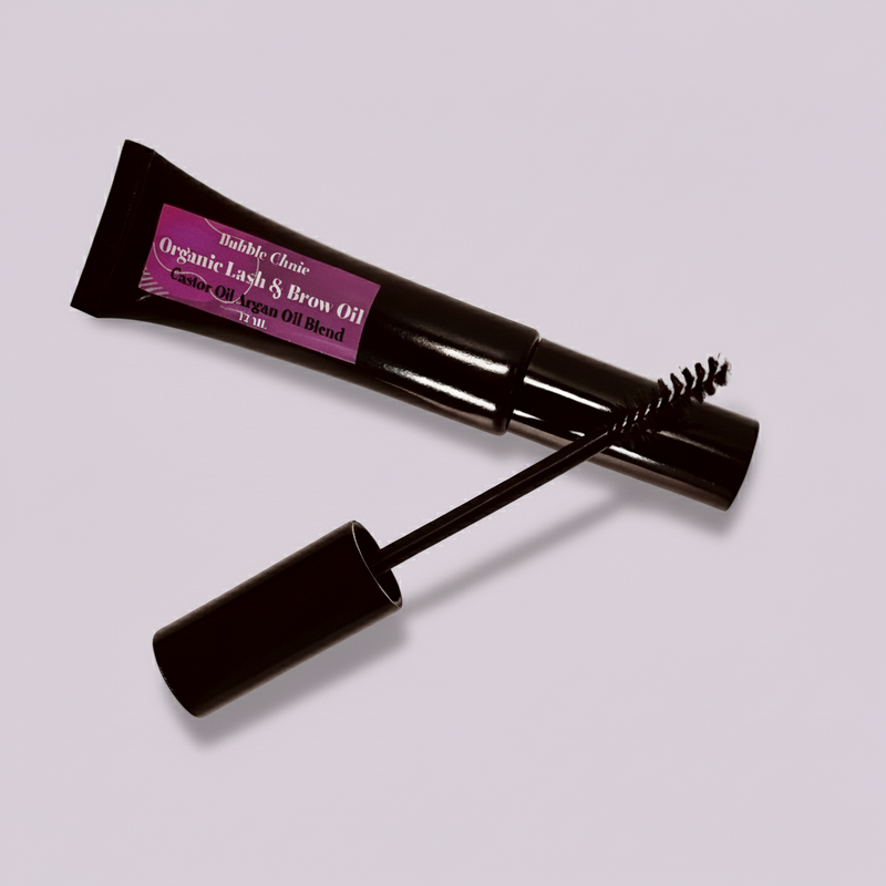 Bubble Clinic lash and brow conditioning oil with castor, moringa and amla oils on a lilac background