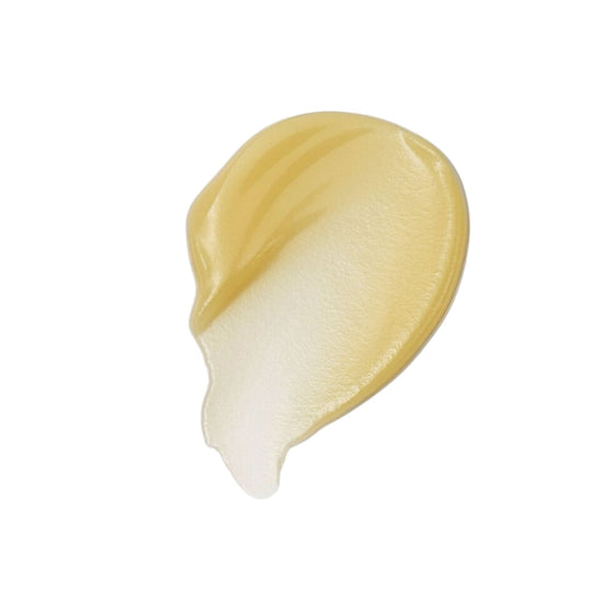 Close-up of Cleansing Balm smear – rich, buttery balm texture on clean white background for natural, gentle makeup removal and deep cleansing.