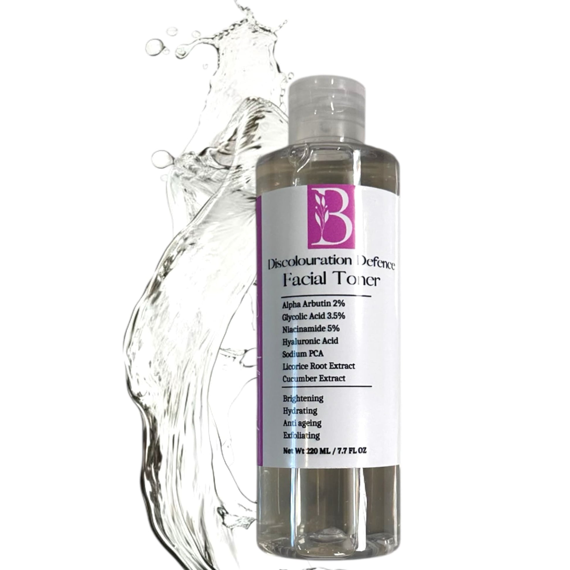 Bottle of Discolouration Defence Toner placed on a clean white background with a transparent splash of the toner beside it. Emphasizes the clarity, purity, and refreshing texture of the formula.