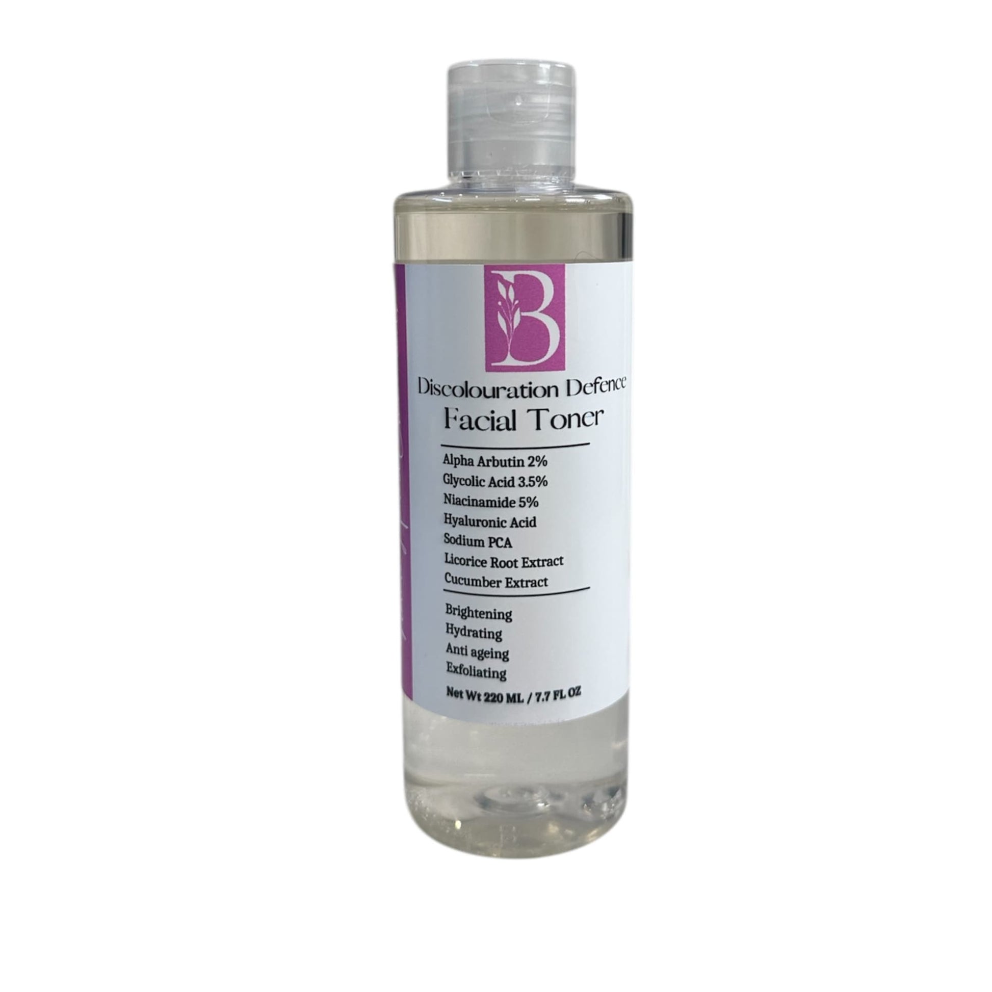 Close-up of Discolouration Defence Toner bottle on white background with visible label showing natural ingredients and benefits like brightening, hydrating, exfoliating, and anti-aging.