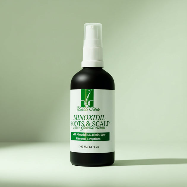 A bottle of Minoxidil 5% hair growth serum with additional ingredients such as Biotin, Saw Palmetto, and Rosemary listed on the label.