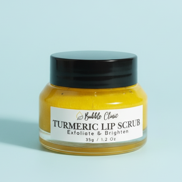 Glass clear jar of turmeric lip scrub for dark lips with black lid of natural turmeric lip scrub revealing bright yellow hue of the lip scrub with partial image of open jar of the scrub highlighting soft creamy texture of the lip scrub. 