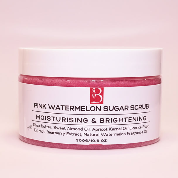 Close-up of Pink Watermelon Brightening Sugar Scrub in a sealed white-lid tub against a clean white background, highlighting its nourishing exfoliating formula.