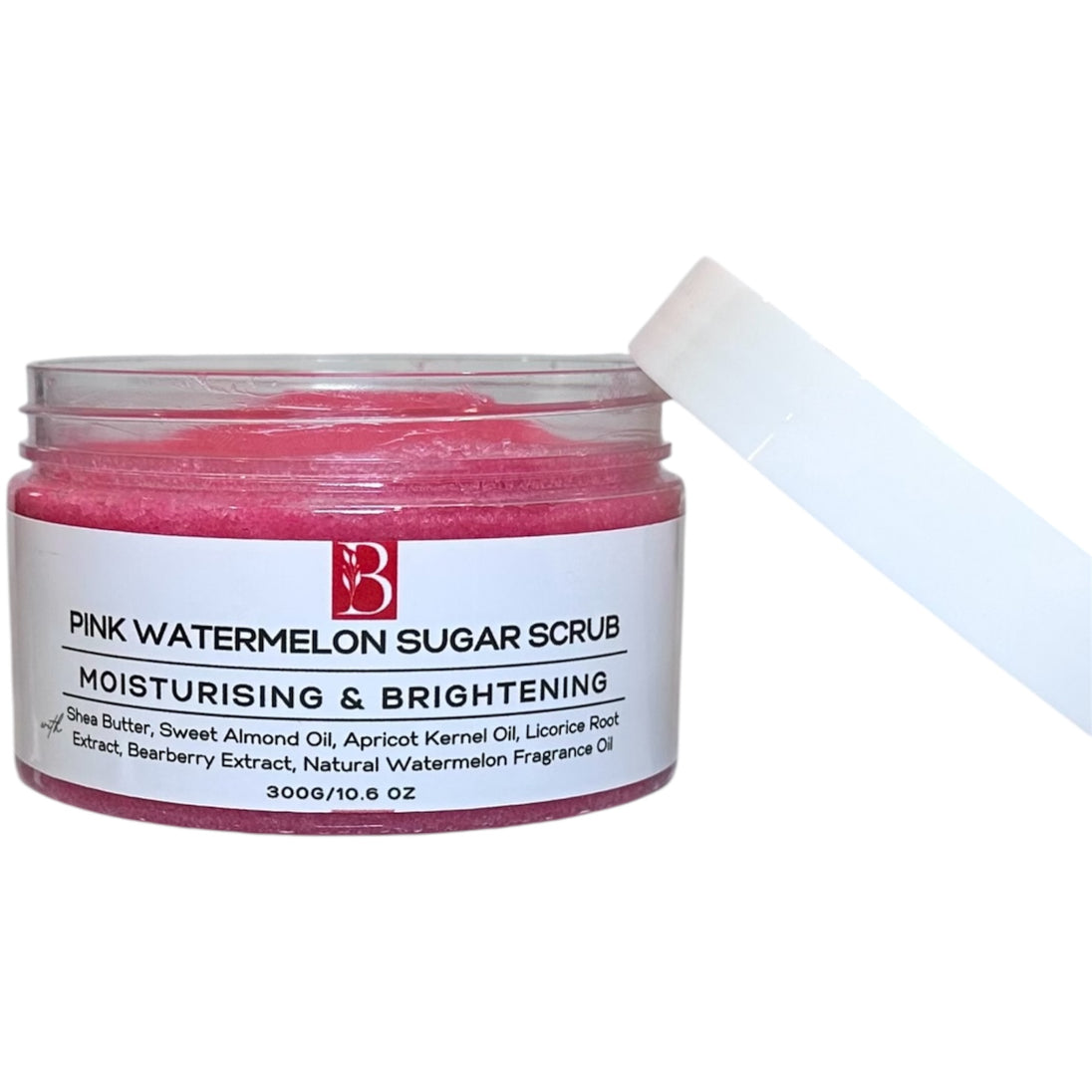 Open tub of Pink Watermelon Brightening Sugar Scrub with the lid off, revealing its rich, smooth texture. Vibrant pink exfoliating scrub set against a clean white background.