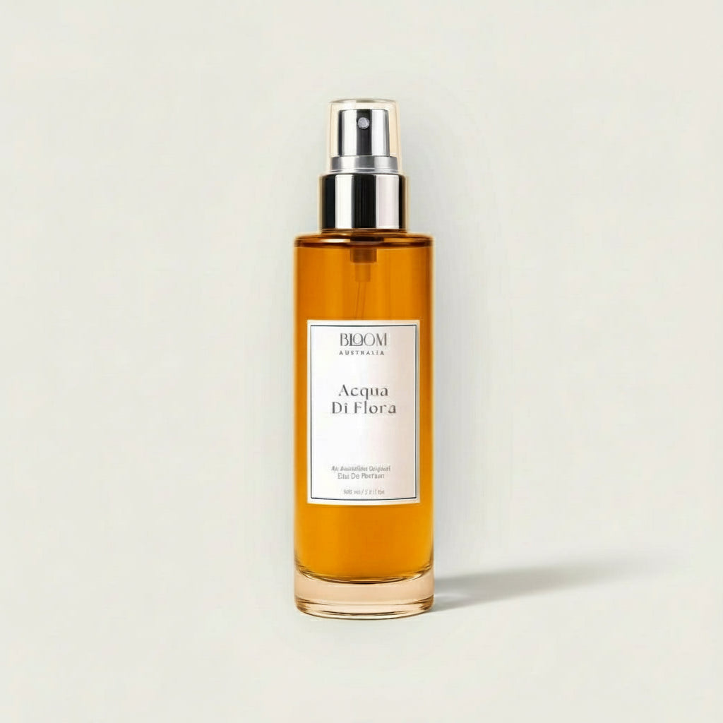 bottle of acqua di flora citrus floral perfume with silver cap and white label on beige background representing australian natural perfumes with essential oils.