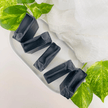 Natural activated charcoal soap for oily acne prone skin. Close up of five bars against clean, bright background representing natural Australian skincare for oily, acne prone skin.