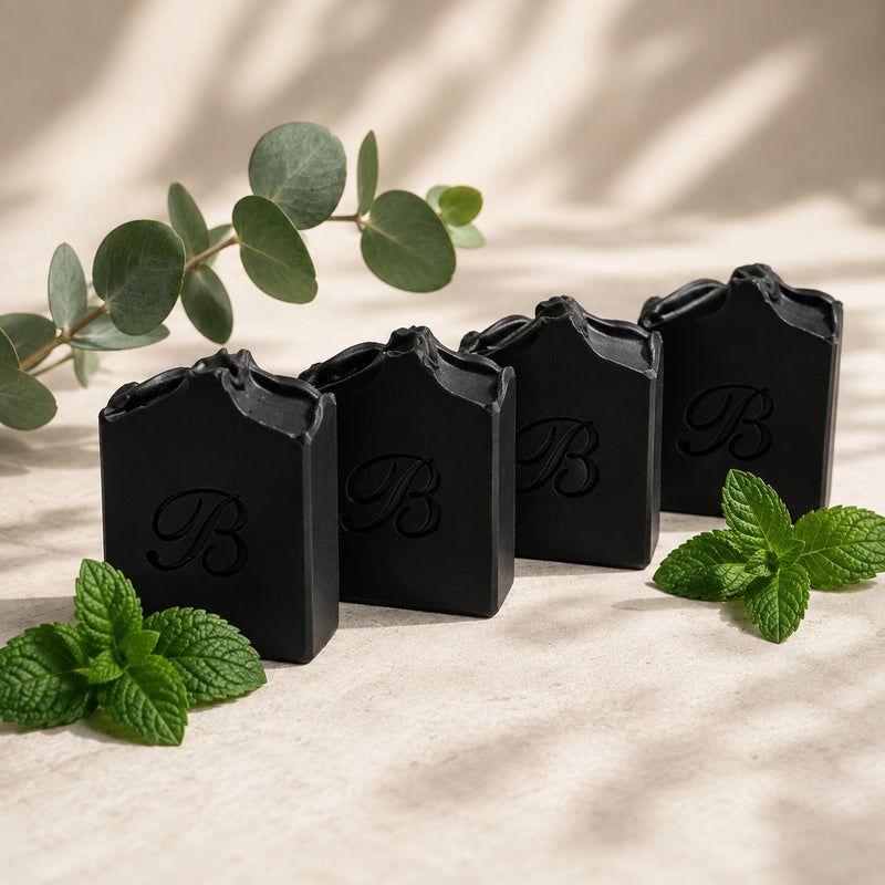 Bubble Clinic activated charcoal soap four bar artisan soap lineup with peppermint and eucalyptus