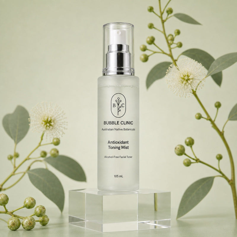 Bubble Clinic Antioxidant Toning Mist 105 mL alcohol-free facial toner in frosted bottle on muted sage studio backdrop with Australian native botanicals