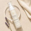 Bubble Clinic Barrier Bright 45 mL airless moisturiser flat lay with lavender and cream fabric