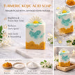 Turmeric Kojic Acid brightening Soap for dark spots and acne scars with decorative elements on a light background