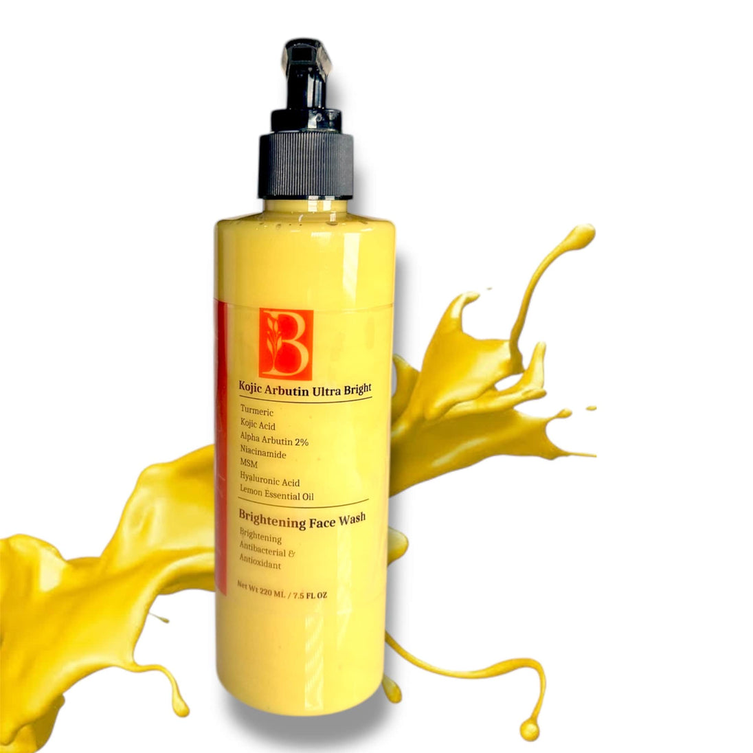 Close up of brightening Turmeric, Kojic Acid and Alpha Arbutin Face Wash with a vibrant turmeric yellow splash of the creamy cleanser in the background.
