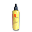 Bottle of natural brightening turmeric, kojic acid and alpha arbutin face wash against pure white backdrop representing clean beauty and natural australian skincare.