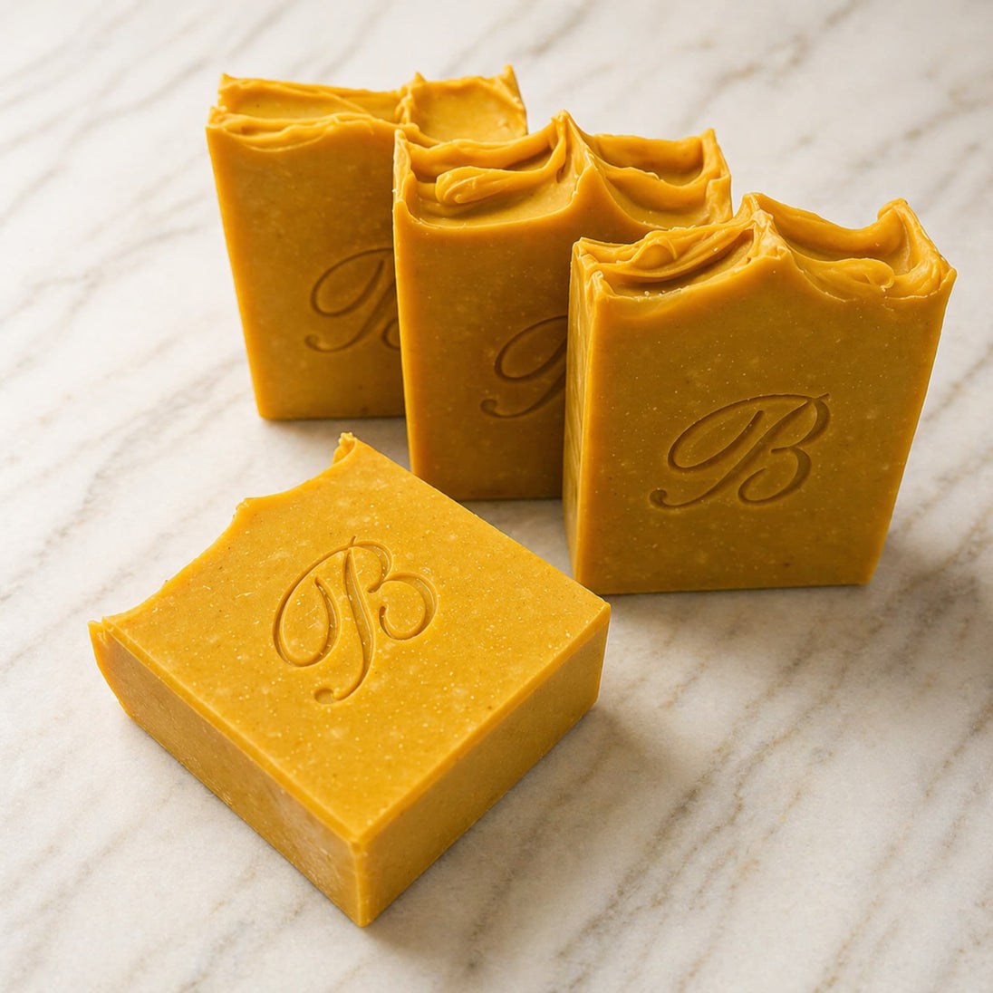 close up of four Natural Brightening Turmeric Kojic Acid Soap Bars with grass fed beef tallow, extra virgin olive oil, castor oil and coconut oil - Handmade Facial and body Cleansing Soap for Dark Spots, Acne Marks, Uneven Skin Tone and Glowing Skin Australia