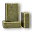 Olive and 30% laurel oil soap bar showing its natural green colour and rustic finish