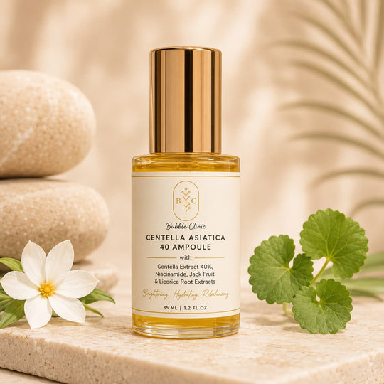Bubble Clinic Centella Asiatica 40 Ampoule with 40% Centella extract and niacinamide shown in a luxury skincare setting with botanical leaves.