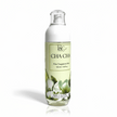 Bottle of Cha Cha fine fragrance mist with a green label on a white background