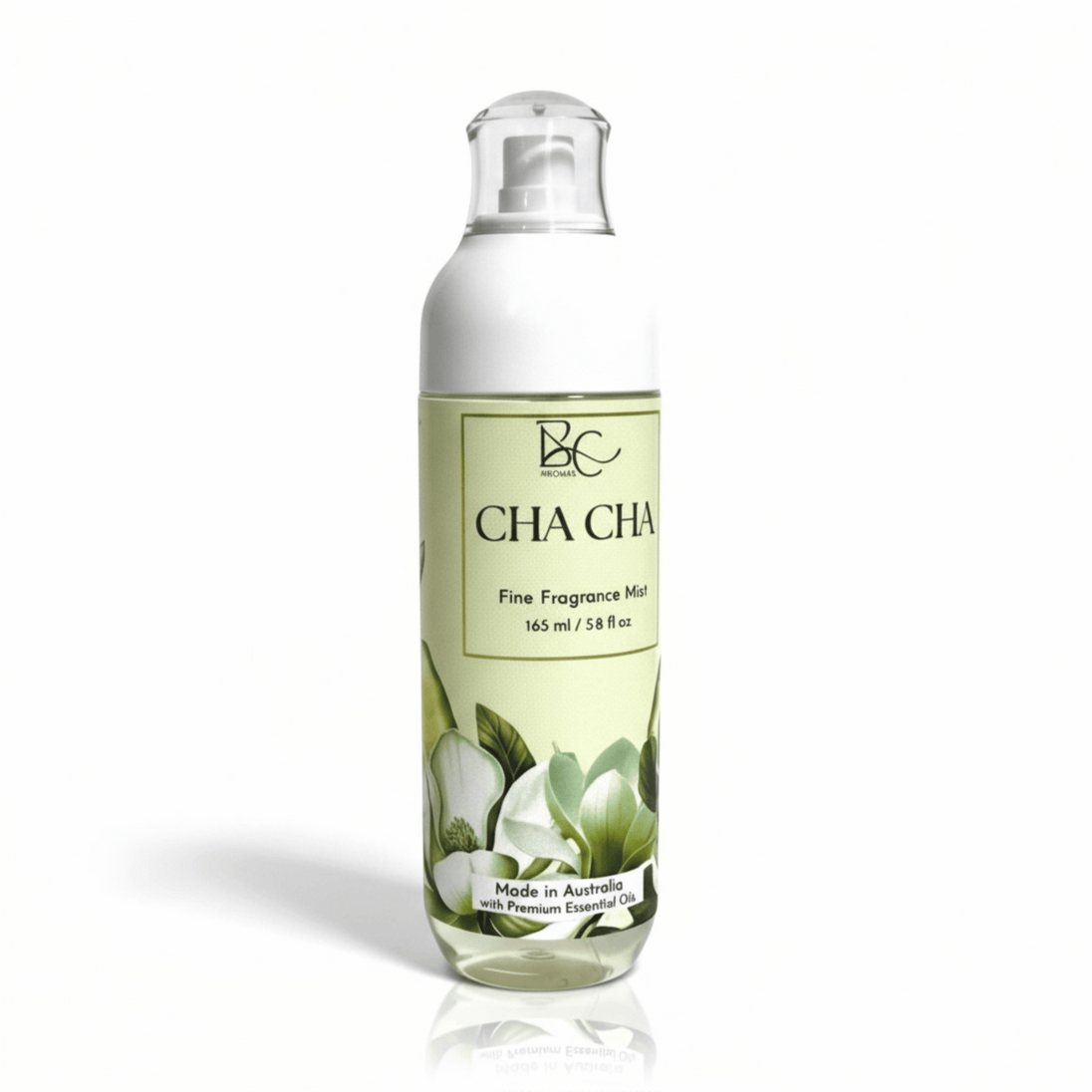 Bottle of Cha Cha fine fragrance mist with a green label on a white background