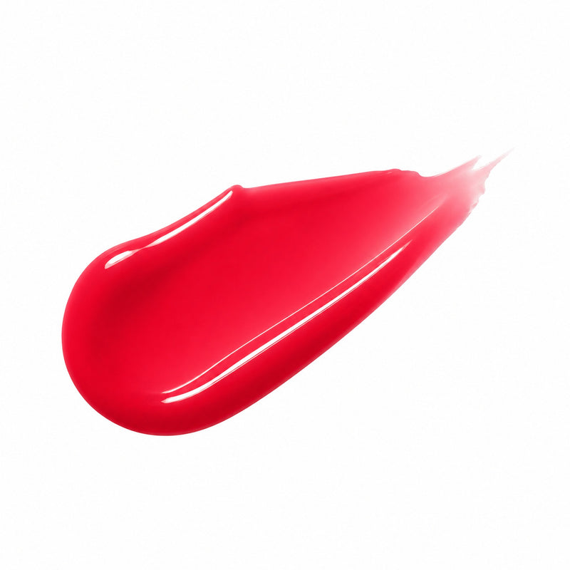 Cherry tinted lip oil swatch in bright sheer red glossy finish