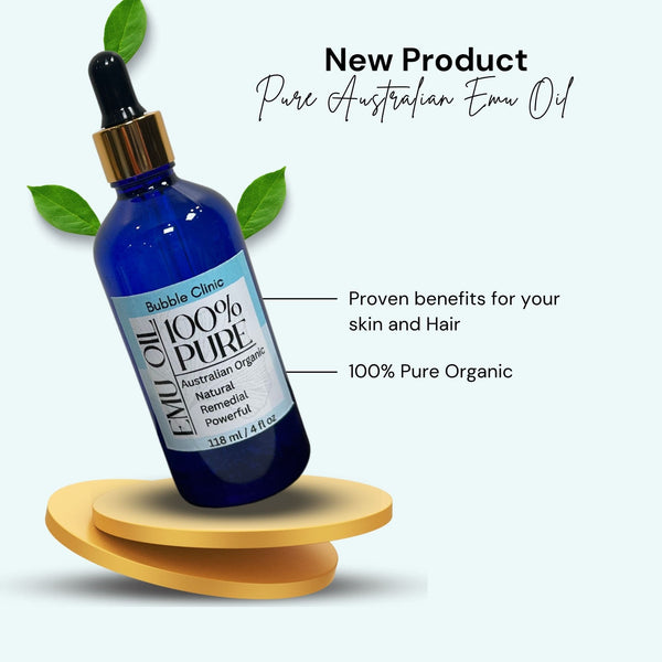 light background with tilted blue glass serum bottle of pure organic Austrlian emu oil.