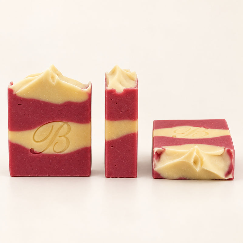 Australian handmade goat milk soap shown from the front, side and sculpted top