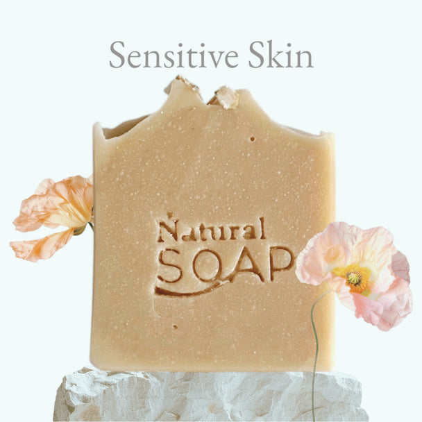 close up of front, upright organic milk soap with colloidal oatmeal and organic honey to soothe irritated, dry skin. Best for eczema and psoriasis.