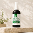 5% Minoxidil Intensive Hair + Scalp Serum bottle on travertine