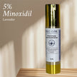 front view of minoxidul luxury gold bottle of maximum strength minoxidil with biotin, peptides, saw palmetto for natural powerful hair regrowth treatment.