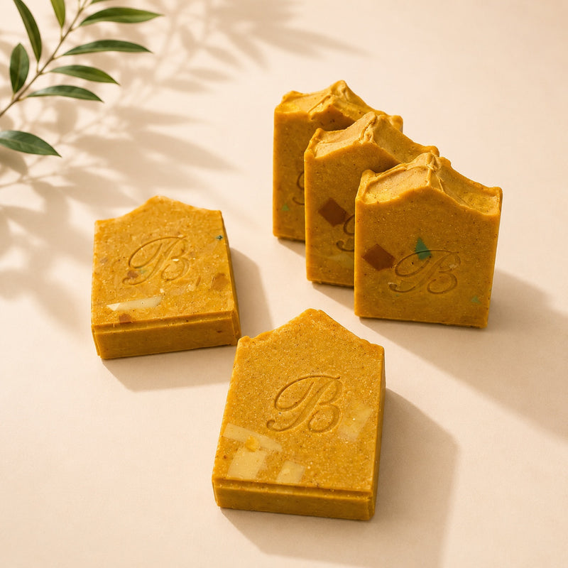 Jumbo turmeric kojic acid soap bars showing handmade texture and embossed finish