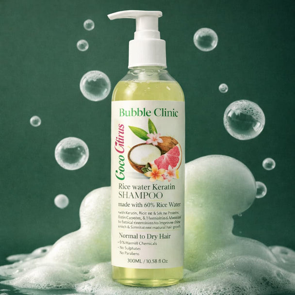 Bottle of Bubble Clinic rice water and keratin  shampoo for dry, damaged and chemically treated hair with bubbles and a green background representing best Australian Sulfate free haircare