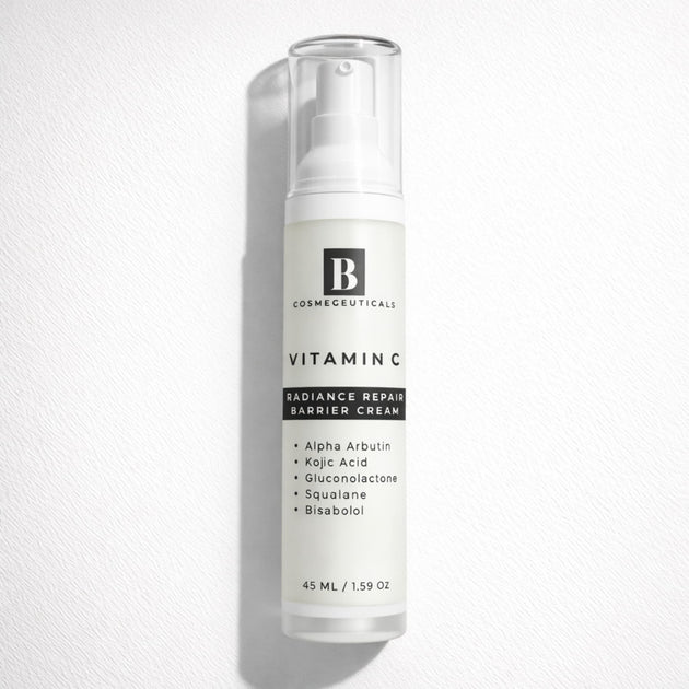 Skincare bottle labeled 'Vitamin C Radiance Repair Barrier Cream' with brightening actives alpha arbutin, koic acid, gluconolactone and soothing squalane and bisabolol ona white background representing best clean beauty Australian skincare.