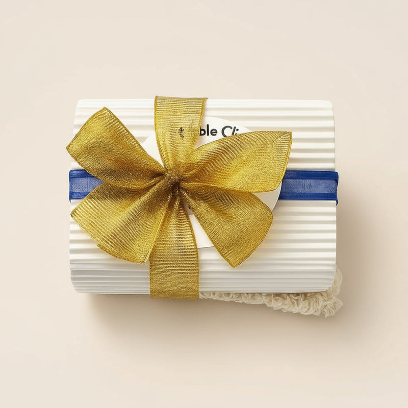 brightening kojic and turmeric soap ends bundle gift packaged with gold ribbon against light background representing best natural brightening skincare Australian made.
