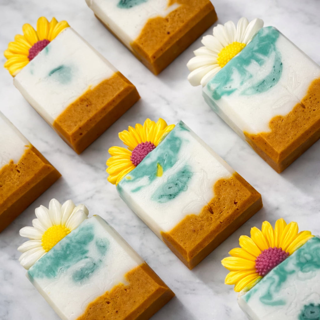 Kojic acid turmeric soap for skin brightening and hyperpigmentation – natural glycerin soap with shea butter and organic turmeric on marble surface.