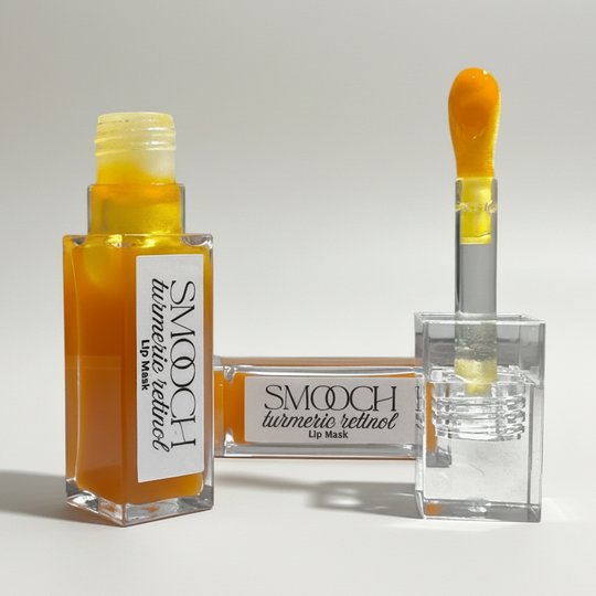 two clear bottles of turmeric lip mask treatment with retinol and squalane for dark lips on beige background representing best natural australian skincare.