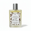 Bottle of luxury hair perfume with keratin, argan oil and Japanese Honeysuckle essential oil with floral label on a white background