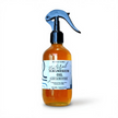Bottle of natural magnesium oil with a spray nozzle on a white background