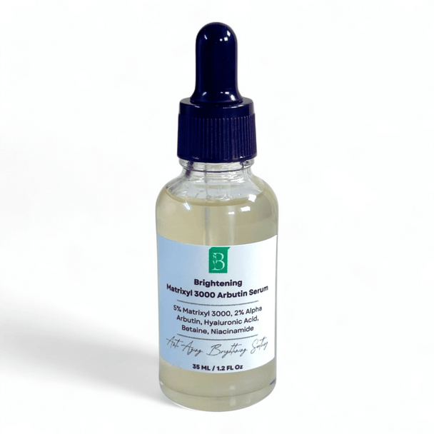 clear glass dropper bottle with label brightening matrixyl 3000 serum with alpha arbutin, hyaluronic acid, betaine and niacinamide against white background representing best natural australian skincare for bright skin.