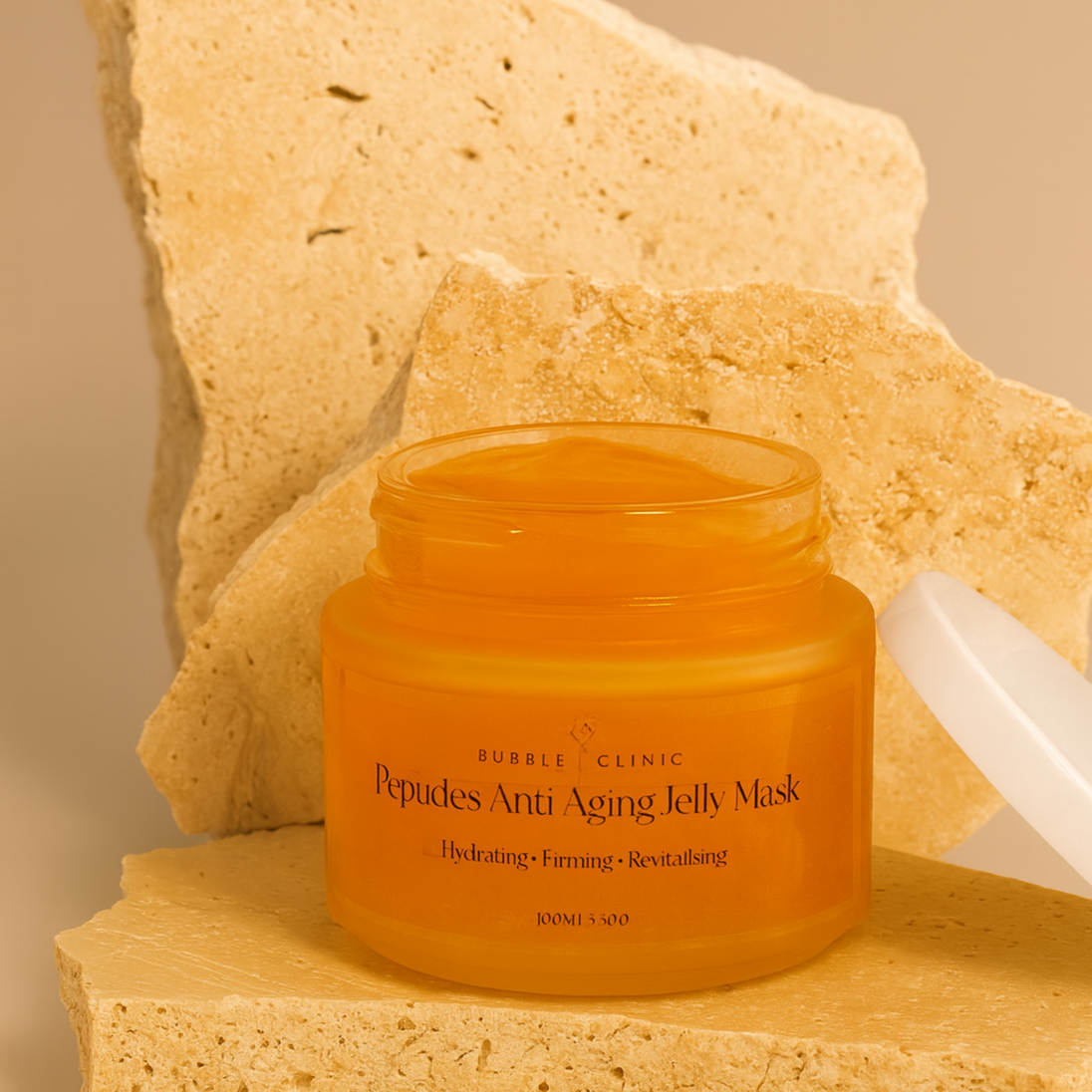 Anti Aging Peptides Orange jelly mask jar labeled 'Bubble Clinic Peptides Anti Aging Jelly Mask' on a stone background