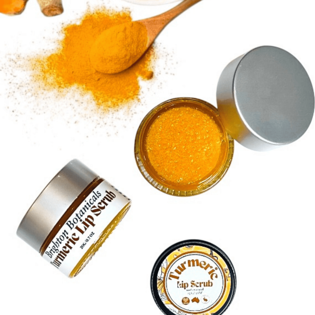 bright white background with organic turmeric and luxury glass jars with brightening turmeric scrub. 