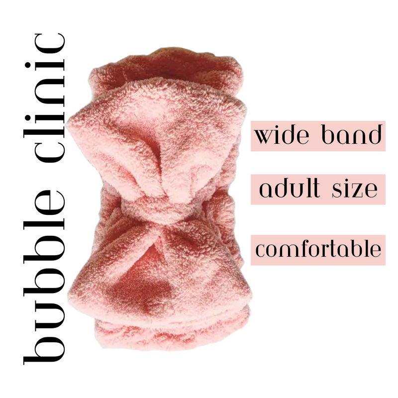 Soft double-lined microfibre spa headband with wide stretch fit on a white background.