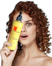 woman holding next to her face bottle of natural brightening turmeric and kojic acid face wash with alpha arbutin and vitamin c representing natural australian brightening skincare and organic turmeric kojic acid face wash