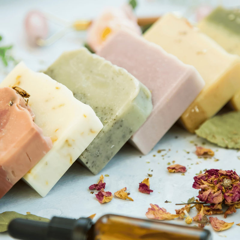 Selection of assorted Bubble Clinic artisan soap ends with botanical styling