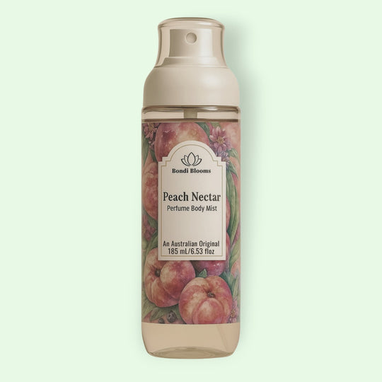 Peach Nectar, long wearing fruity perfume body and hair mist bottle on a light green background representing best body and hair perfume Australian made. 