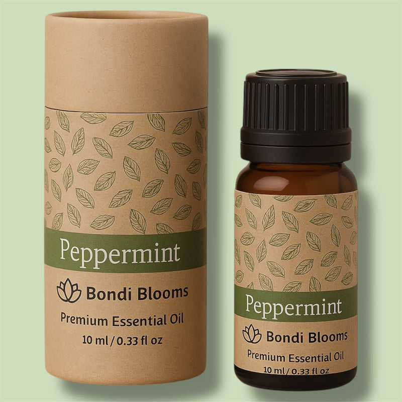 Peppermint Arvensis Essential Oil bottle and packaging on a light green background.