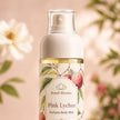 Close-up of Bondi Blooms Pink Lychee Body Mist decorative botanical label and spray bottle